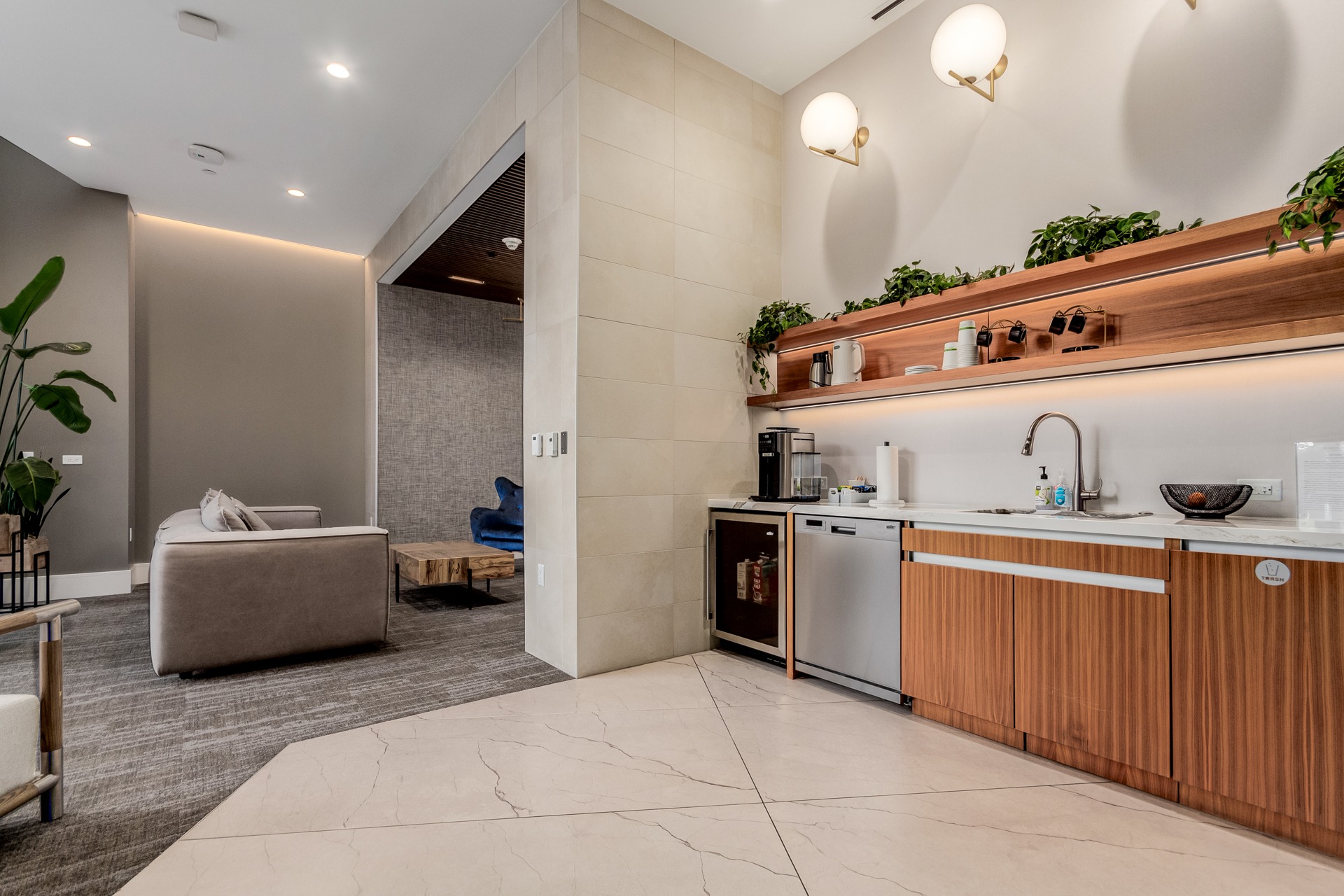 Complimentary coffee and tea station in the McGregor Square residential lobby